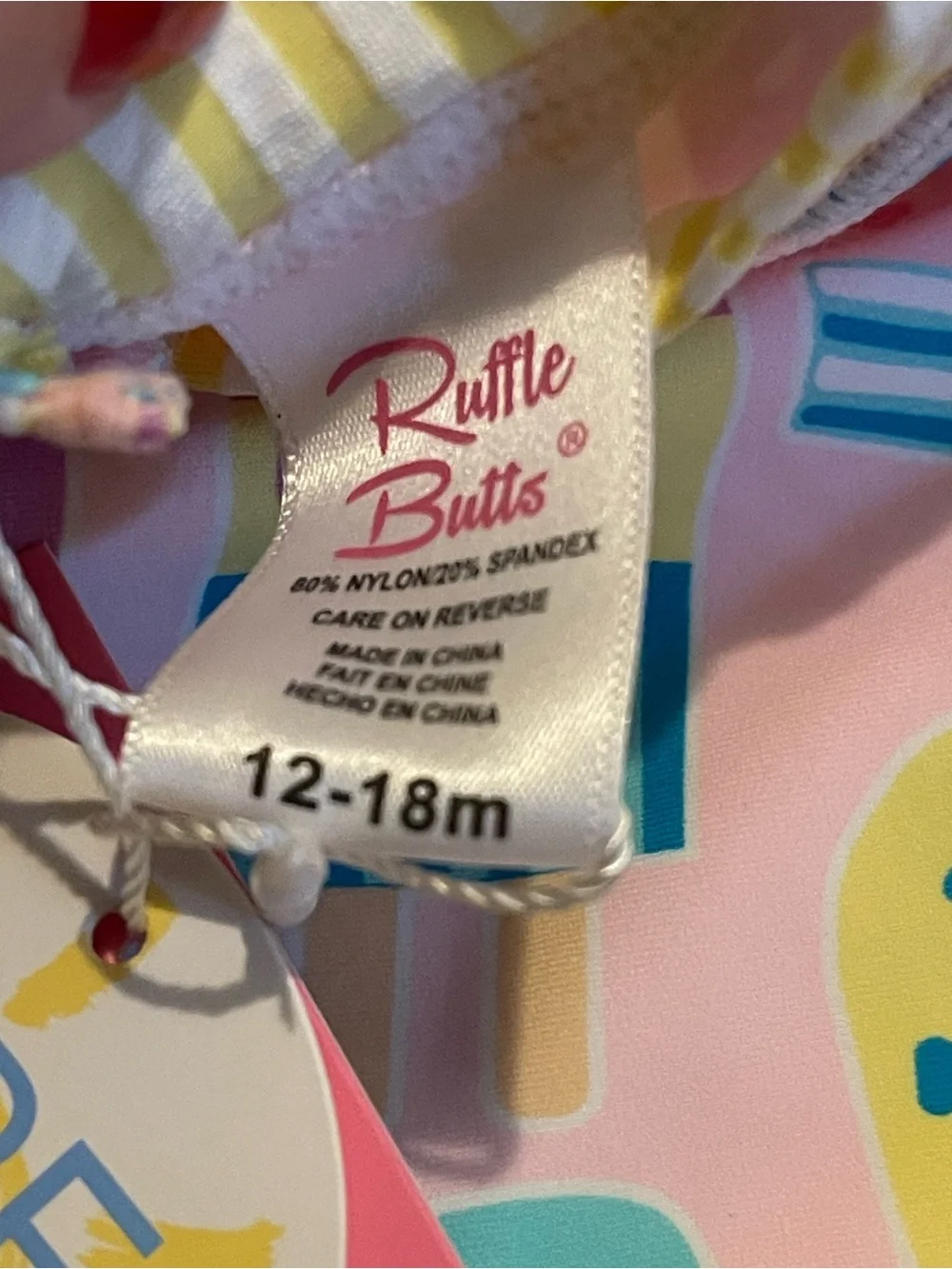 Ruffle Butts Pink Popsicle-Print Long Sleeve Rashguard One-Piece
